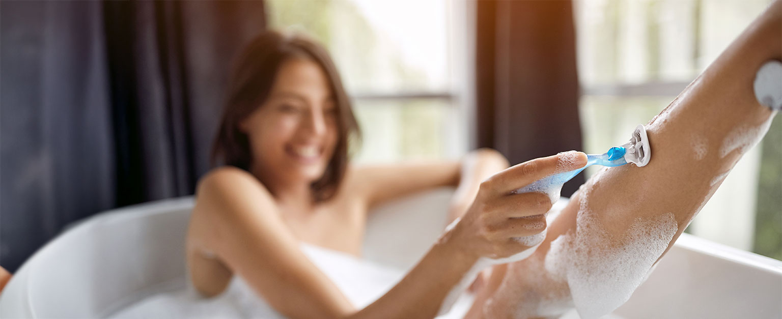 woman shaving in bathtub irritation free